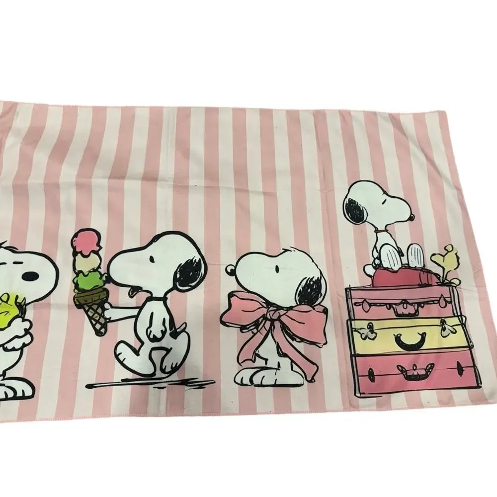 Snoopy in different activities beach towel pink stripes